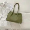 Bolso de mano tejido estilo relajado para mujer, nuevo modelo 2026, nicho de lujo ligero, de alta gama, gran capacidad, para el hombro/debajo del brazo