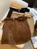 Mini falda de ante peluche ajustada a la cadera para mujer, otoño e invierno, versátil, de cintura alta, adelgazante, anti-exposición, línea A, para chica popular A14897