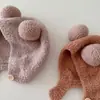 Orejeras para bebé estilo coreano ins otoño e invierno nuevo cálido a prueba de frío sombrero cómodo para bebé Doble Bola suave pegajoso gorro de pie moda
