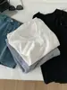 Camiseta de bolsillo de cuello en V deshilachada estilo "old money" relajada para mujer, verano 2026, algodón copo de nieve, caída fluida, talla grande, top de manga corta que estiliza