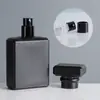 Botella de perfume de vidrio negro mate de fábrica 2030ml50ml100 ml cuadrada plana atomizador color bayoneta atomizador fino