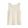 Simples, porém elegante: um colete de cashmere feminino com gola redonda, gola semiaberta, design sem mangas e detalhes em tricô abotoados, um suéter versátil com alças
