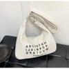 Bolso de mano artístico de gran capacidad para mujer, novedad de verano 2024, sencillo e informal, bandolera de alta gama