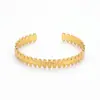 Suministro exclusivo transfronterizo de brazaletes abiertos de acero inoxidable europeos y americanos para mujer, pulseras de alta gama con forma de C prensadas en aceite, joyería de moda al por mayor