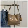Bolso tipo cubo de alta apariencia Modelo Nuevo 2025 Color Sólido Personalidad Tendencia Bolso de Mano Bolso de Mano para Commuter de Ins Bolso de Hombro para Debajo del Brazo
