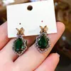 Pendientes de Flor de Zirconia Esmeralda Retro Aguja de Plata Calabaza Gota de Agua Lujo Ligero Nicho Temperamento Pendientes de Gama Alta para Mujer