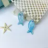 Estilo Vacacional Azul Peces Coloridos Mosquitero Pinza para Oreja Atmósfera de Verano en la Costa Dulce y Lindo Infantil Diseño de Nicho
