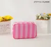 Nueva Bolsa de Maquillaje Rayada con Borlas, Simple y Fresca, Bolsa Portátil de Viaje para Artículos de Tocador y Lápices Labiales