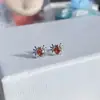 Araña de viento oscuro love hueso de oreja clavo dulce fresca chica chica caliente oreja caracol nicho circón pendiente
