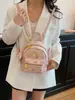 Mochila de estilo lujo ligero con estampado de oso para mujer, mini mochila versátil coreana con un toque juvenil, adecuada para estudiantes y para ir al trabajo.