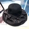 Moda de Verano Protección UV Pegamento Negro Sombrero de Playa Ala Ancha Lazo Sombrero de Pescador Sombrero de Sol para Viajes de Negocios Venta al por Mayor