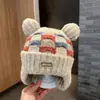 Bonitos y adorables gorros de otoño e invierno para niños, con diseño de poner, material de punto y una serie de dibujos animados, que brindan abrigo y protección para los oídos para bebés y niños pequeños.