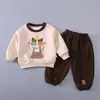 Conjunto de Ropa de Otoño para Niños 2026 Nuevo Estilo Primavera y Otoño Infantil Sudadera con Capucha de Dibujos Animados Manga Larga Conjunto de Dos Piezas Ropa Casual Moderna para Bebé