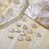 Arte de unhas de celebridade flor de ameixa diamante pontiagudo super brilho cristal transparente rosa champanhe decoração de unha fábrica de diamantes atacado
