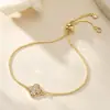 Pulsera de Lujo Ligero de Alta Gama para Mujer Aogu, Cobre Chapado en Oro de 18 Quilates con Incrustaciones de Circonita, Diseño de Flor Hueca, Suministro de Comercio Exterior