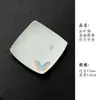 Juego de té de cerámica pintado a mano bajo vidriado con motivos de mariposas y flores, que incluye un gaiwan, tetera, taza de té, platillo, posavasos y vaso de agua
