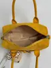 Bolso de mano casual de moda nuevo para principios de otoño de 2026, Boston de alta estética para el trabajo, bolso de hombro y cruzado