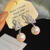 Pendientes de Perla Mariposa Suaves 2026 Nuevo Estilo Caliente Pendientes Únicos de Gama Alta Pendientes de Estilo Nicho Primavera y Verano para Mujeres