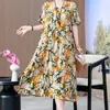 Novo Vestido de Verão Solto e Elegante para Mães Jovens com Barra Larga Saia Estampada de Comprimento Médio Tamanho Grande Manga Curta Saia de Praia