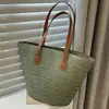 Bolso tejido de paja para mujer de gran capacidad 2022 nueva moda otoño e invierno bolso de hombro tejido clase de textura bolso tote para ir al trabajo