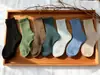 Calcetines de Media Pantorrilla para Mujer 2026 Nuevos de Otoño e Invierno Estilo Japonés Casual Estudiante Calcetines Simples de Moda Color Sólido Calcetines Holgados