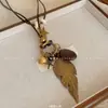 Nuevo Collar Colgante Largo Estilo Chino Cadena de Suéter con Perlas Estilo Étnico Retro Cadena de Suéter con Perlas Nicho de Alto Grado Temperamento Collar Venta al por Mayor