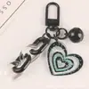 Llavero Colgante de Campana Creativa en Forma de Corazón para Coche, Accesorio de Cadena Acrílica Fresco y Colorido, Decoración para Bolso de Pareja