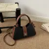 Bolso pequeño cuadrado de moda estilo francés, nuevo modelo 2026, bandolera de versión coreana texturizada, elegante y versátil para ir al trabajo, bolso de axila