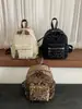 Mochila Mini de Moda Europea Transfronteriza Nueva Bolsa para Mujer de Comercio Exterior Estampado de Leopardo Flor Pequeña en la Espalda Bolsa de Viaje para Mujer