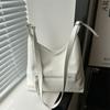Bolsa de grande capacidade para mulheres Primavera/Verão 2024 Nova Moda simples ombro axilar saco trabalho commuter bucket bag couro macio