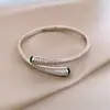 Pulseira Aberta Banhada a Ouro 18k com Zircônia em Formato de Cobra Leve Luxo Sensação de Alto Padrão Pulseira de Nicho Versátil Atacado Mulheres