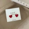Pendientes de Círculo Rojo Cereza Estilo Hong Kong Otoño e Invierno Nuevos Pendientes Geométricos Simples de Aguja Plateada Femeninos Festivos Retro