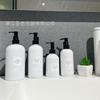 Envase de cosméticos para el cuidado de la piel y el lavado clásico en color blanco y negro, botella de crema de manos, aceite de baño, leche corporal, envase de aceite de masaje