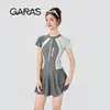 Traje de Baño de Dos Piezas Falda Estilo Nuevo 2026 para Mujer, Conservador, Oculta Abdomen, Adelgazante, Versátil para Deportes Estudiantiles, Traje de Baño Estilo Racing al por Mayor