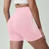 Pantalones cortos de entrenamiento de yoga de tres cuartos de alta elasticidad, control de abdomen, color sólido y bloques de color, transfronterizos europeos y americanos, para ciclismo al aire libre, pantalones cortos de melocotón