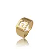Joyería europea y americana moda creativa anillo de 26 letras inglesas dorado apertura ajustable anillo de temperamento para dama