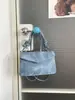 Bolsa de mão pequena para comércio exterior transfronteiriço para mulheres, novo estilo 2026, versátil, moderna e minimalista, bolsa de ombro, bolsa crossbody e pequena bolsa tote quadrada