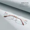 Armazón de anteojos sin montura, estilo cat-eye fresco y sofisticado, de montura estrecha de titanio con memoria y plaquetas nasales de silicona, apto para lentes de prescripción, venta al por mayor Danyang