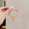 Elástico de cabelo colorido decorado com conchas, tiara de cabelo trançada com pérolas, doce e fofa, elástico para rabo de cavalo, alta elasticidade, adequado para amigas