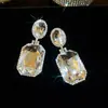 Pendientes colgantes de rombos con borlas tachonados de diamantes de aguja de plata transfronterizos europeos y americanos, pendientes exquisitos y de moda, pendientes versátiles y elegantes al por mayor