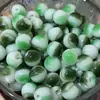 Hebilla de resina de jade para cheongsam Botón de ojo oscuro para traje Tang Hanfu cheongsam Agujero parcial Efecto nube Botón de cuenta redonda de maíz