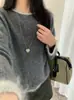 Suéter de Lana con Cuello Redondo de Color Contrastante para Mujer 2026 Otoño e Invierno Nuevo Estilo de Punto Suelto y Relajado