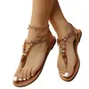 Zapatos de mujer transfronterizos, sandalias planas estilo bohemio con cuentas y pedrería, sandalias casuales de tiras en T y punta abierta para mujer al por mayor