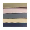 Stock de fábrica Tela Brocado Nube Enrejado Chaqueta Cortavientos Chaqueta de Plumas Ropa Funcional para Exteriores Tela