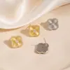 Pendientes de trébol de cuatro hojas con incrustaciones de diamantes para mujer, pendientes vintage de circonita, pendientes de circonita versátiles de lujo ligero con patrón radiante de textura francesa para el día a día