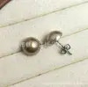 Aretes de Titanio F136 con Efecto Perlado de Ondas de Agua y Cierre de Mariposa Integrado Joyería para Piercings de Aleación de Titanio G23 Venta al por Mayor