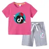 Camiseta Infantil 2026 Tiktok Verano Nuevo Comercio Exterior Ropa Infantil Estilo Coreano Conjunto de Dos Piezas de Manga Corta y Pantalones Cortos para Niños