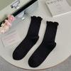 Versión coreana de calcetines dulces de encaje para niñas, calcetines de malla glutinosa suave con rizo, estilo académico, libro rojo pequeño para fabricantes mayoristas transfronterizos