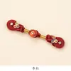 Nuevo estilo chino Qipao botones de rana nudo enrollado cuentas de jade botones de un carácter traje Tang retro Hanfu accesorios decorativos botones botones hechos a mano