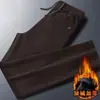 Pantalones largos para hombre transfronterizos, nuevo estilo otoño/invierno, corte holgado, forrados de felpa, engrosados, pana, cintura elástica, pierna recta, pants casuales para hombre